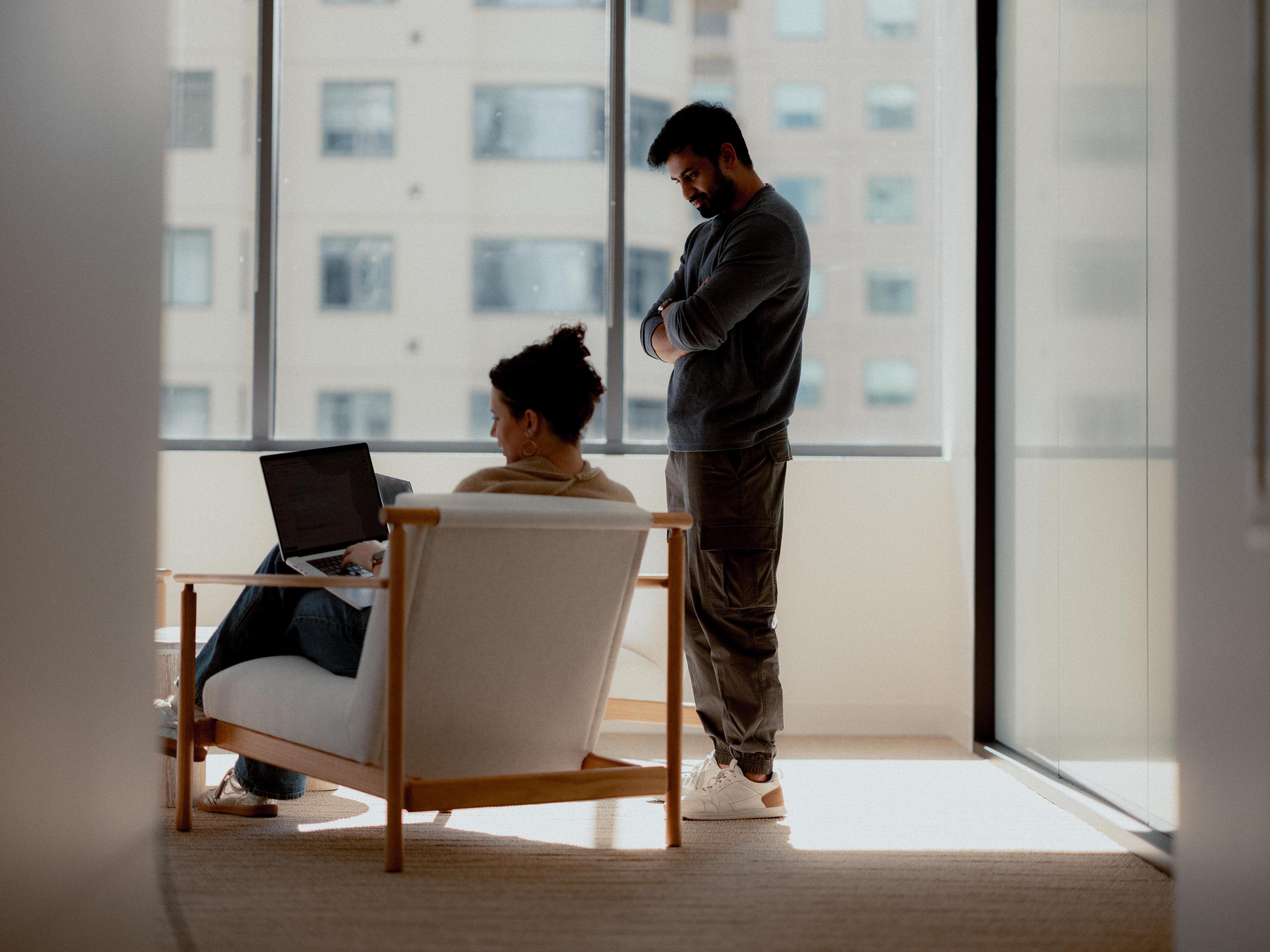 Sierra employees standing by a window